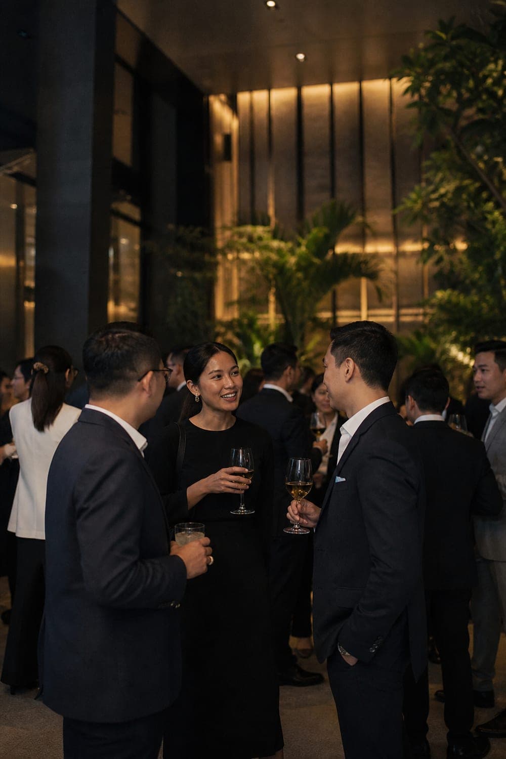 Guests talking at a corporate evening reception